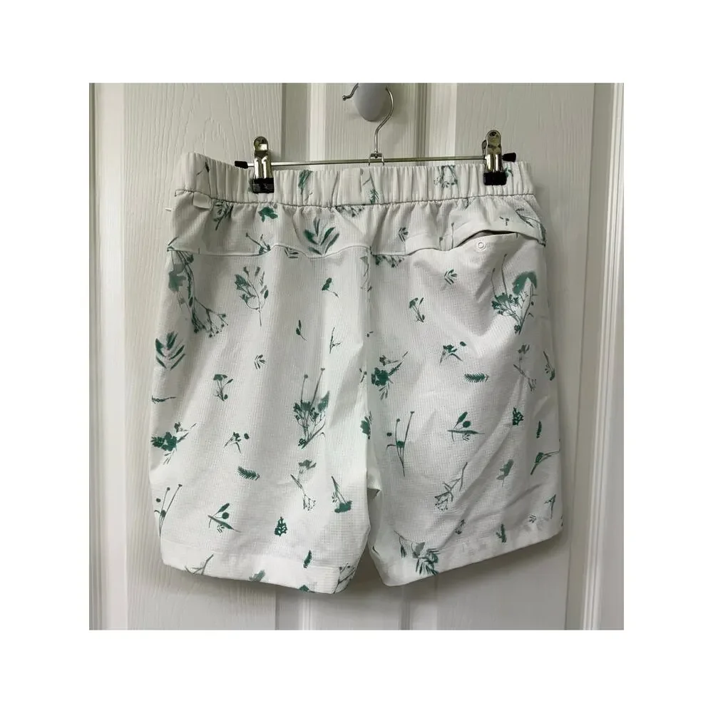 Lululemon Men's Medium swim shorts white base green floral print